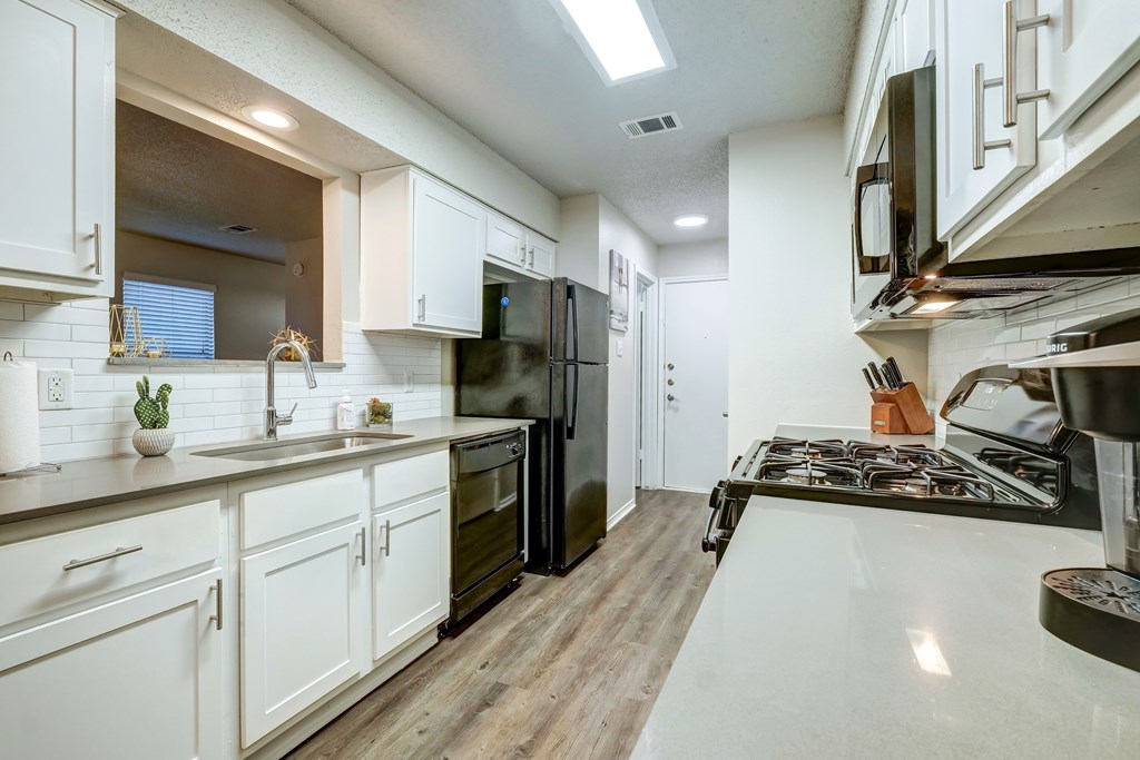 Rock Springs kitchen featuring pass through above sink.