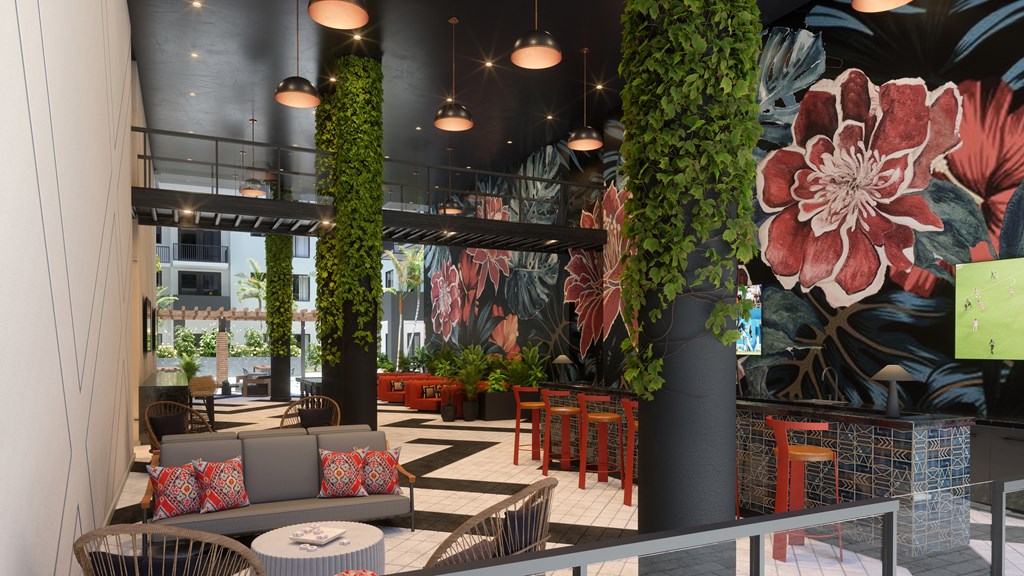 the lobby of a hotel with a large mural of flowers on the wall