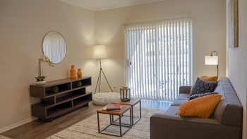 Model Living Room with Patio/Balcony/Yard Access - Photo Gallery 6