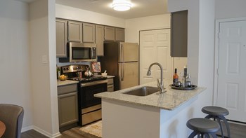 Model Kitchen with renovated cabinetry - Photo Gallery 3