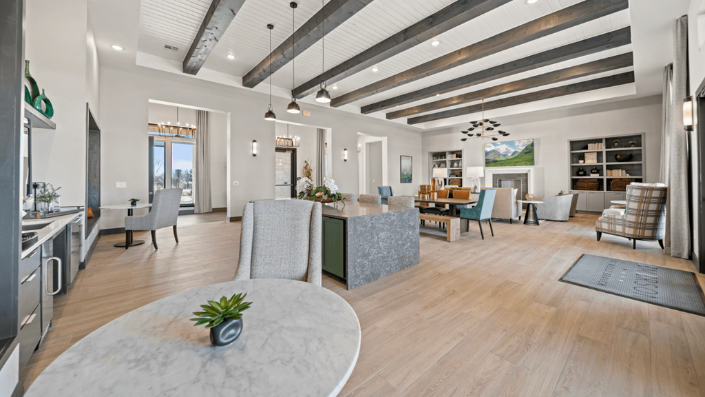 a living room with a dining room and a kitchen