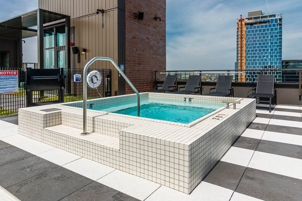 a jacuzzi pool on the roof of a building
