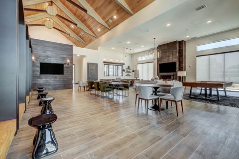 a large living room with a dining room and a kitchen