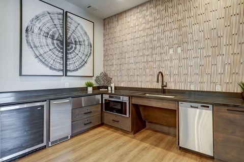 a kitchen with a sink and a dishwasher