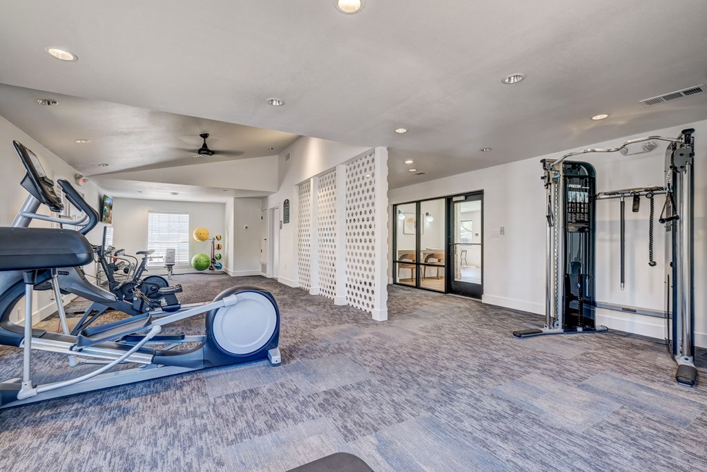 24hr Fitness Center with cardio & weight machines