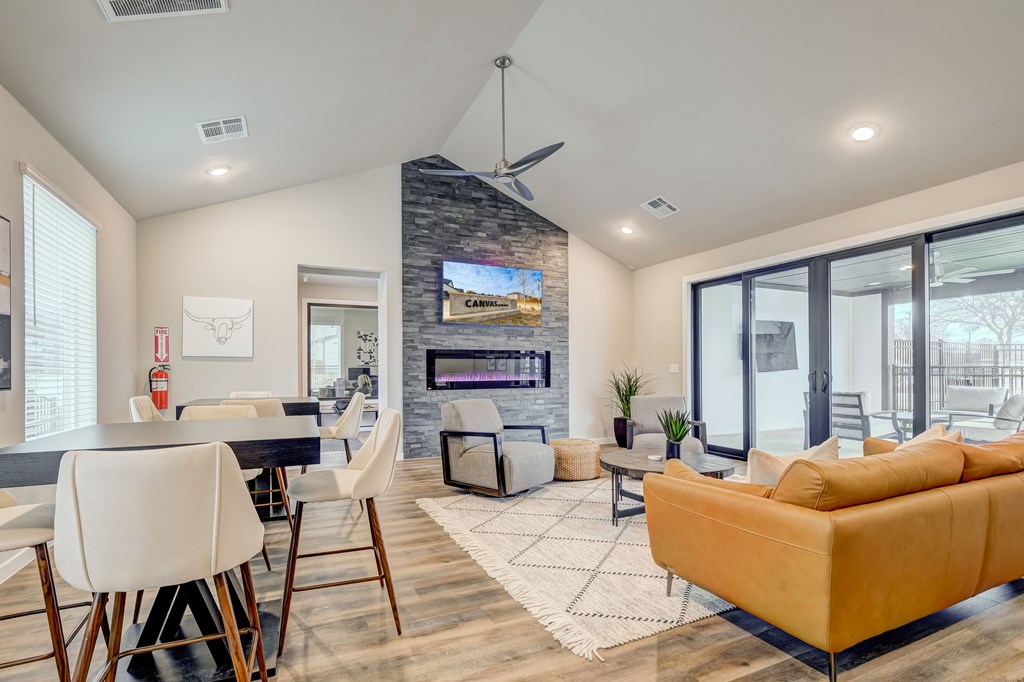 Resident media lounge with fireplace and TV