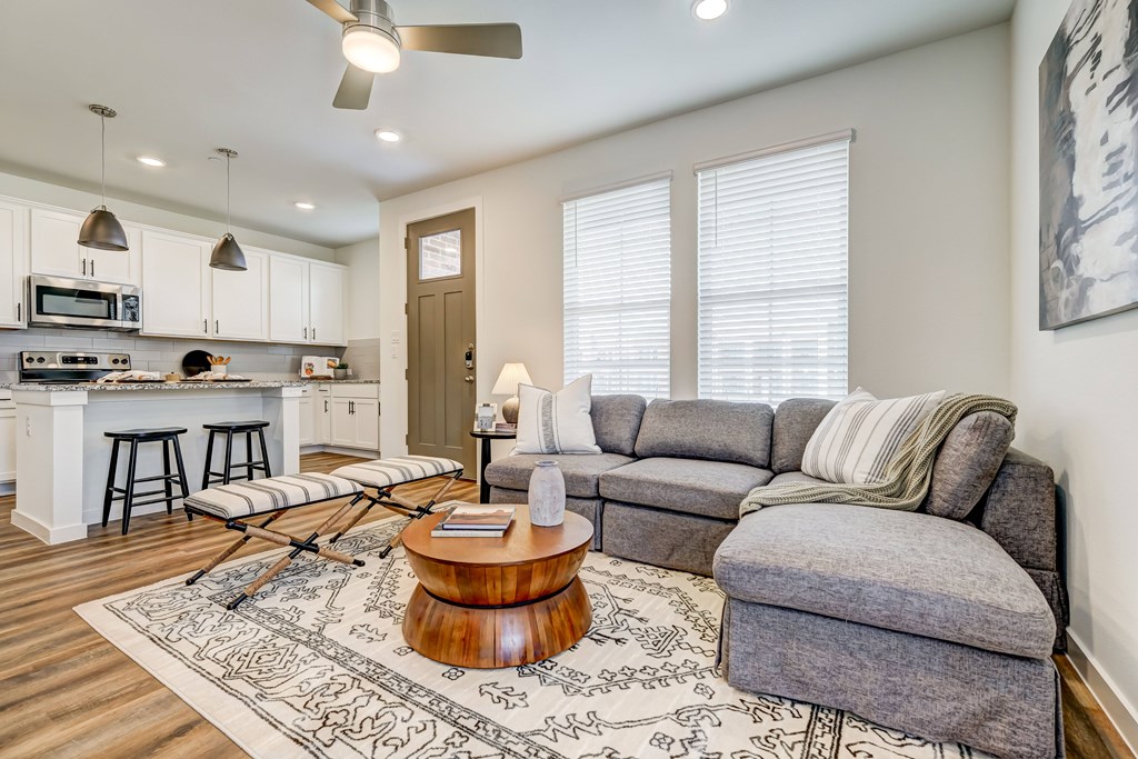 large living room with natural light and open floor plan