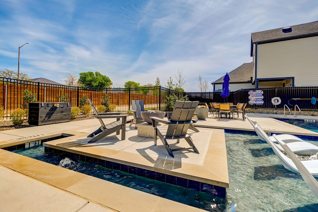 Fire pit poolside resident seating areas in Denton, Texas