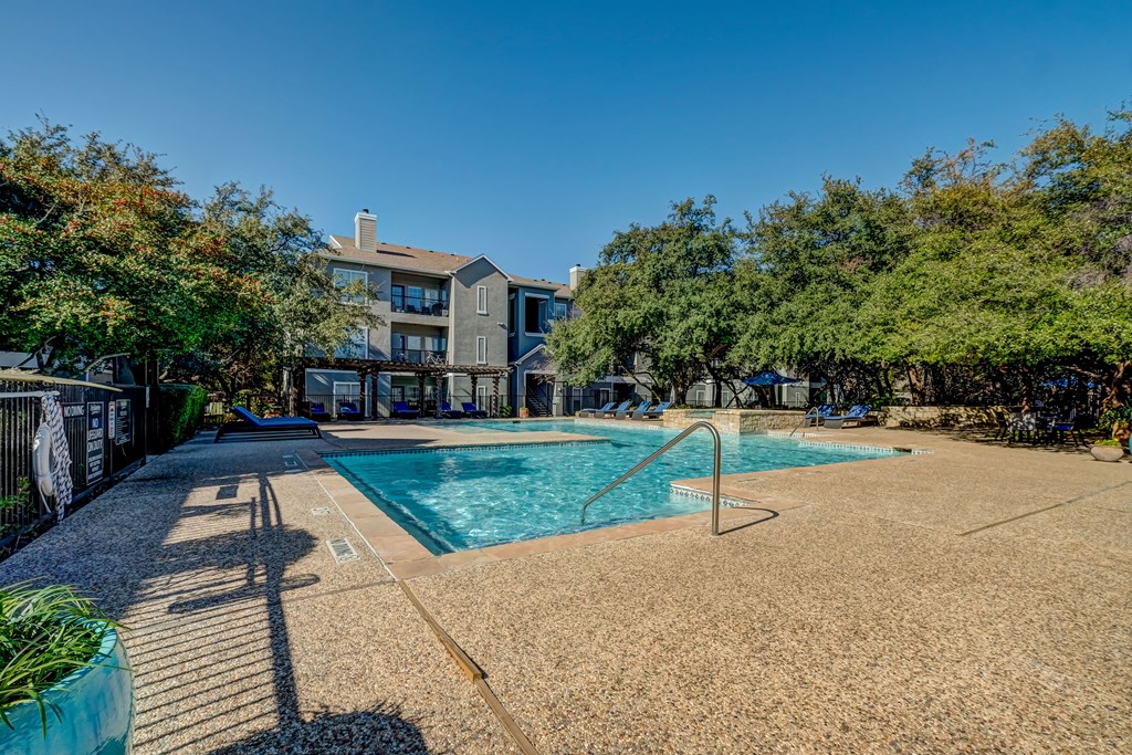 Pool area with poolside loungers