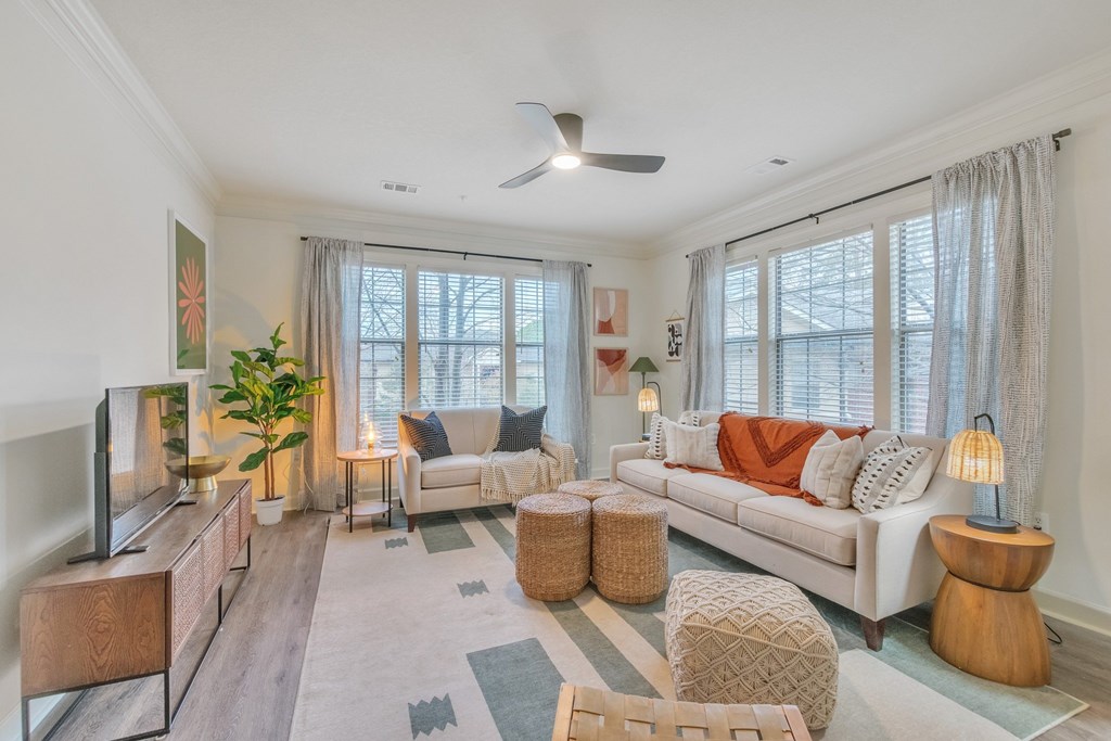 a living room with a couch and a tv