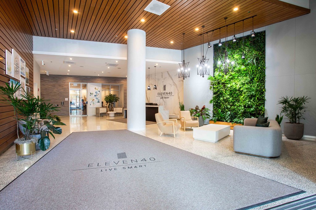 a green wall in the lobby of an office building at Eleven40, Illinois, 60605