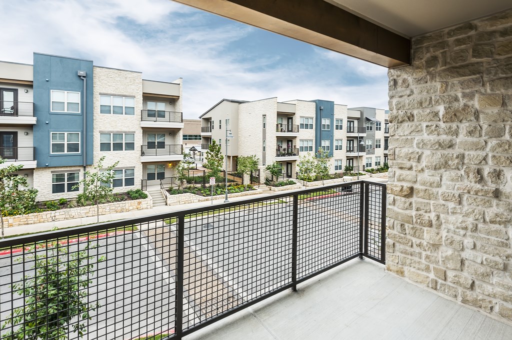 the preserve at ballantyne commons balcony view of apartment buildings