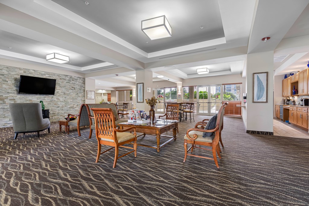 Gaming room with 4 top table seating and serving kitchen for events Gaming room with 4 top table seating and serving kitchen for events