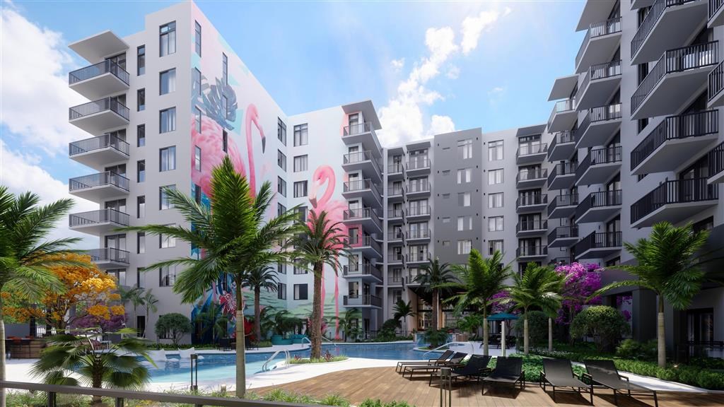 an apartment building with a pool and palm trees