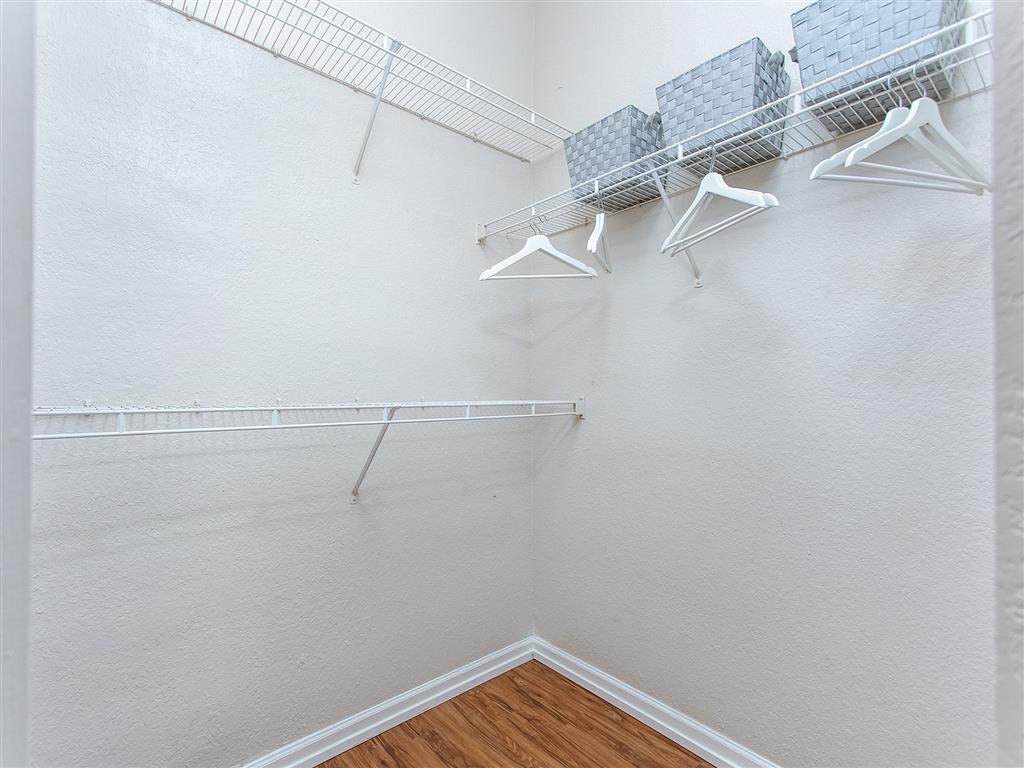 our spacious closets in the living room are equipped with shelves and hooks
