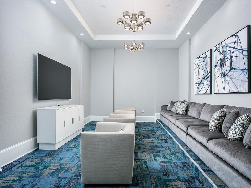 a living room with couches and a television