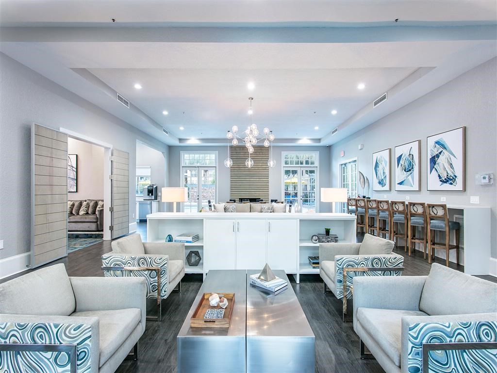 a living room with couches and a table