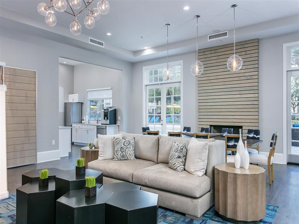 a living room with a couch and a table