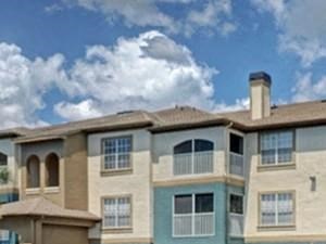 Exterior of three story apartment buildings with breezeways and attached garages Exterior of three story apartment buildings with breezeways and attached garages - Photo Gallery 6