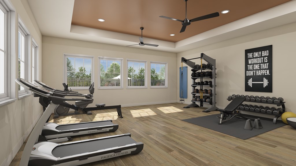 a gym with treadmills and other exercise equipment