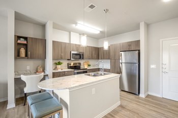 Model kitchen with island and stone countertops - Photo Gallery 2