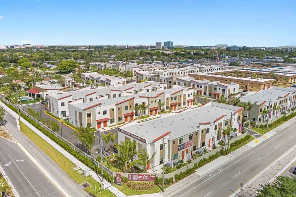 an aerial view of a development of town houses on a city street