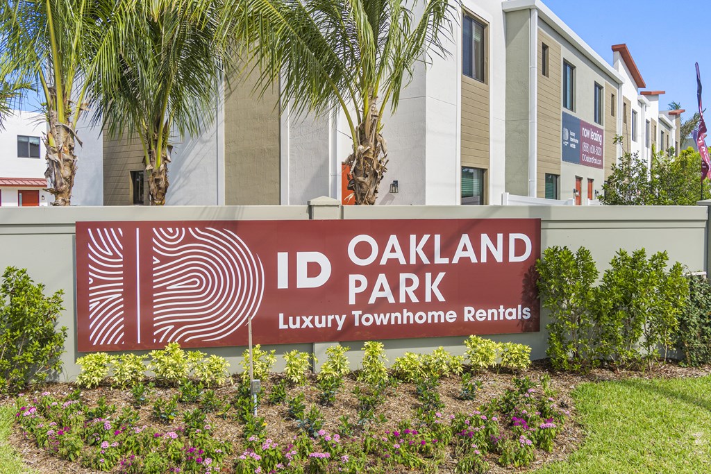 a sign for the id oakland park luxury townhomes