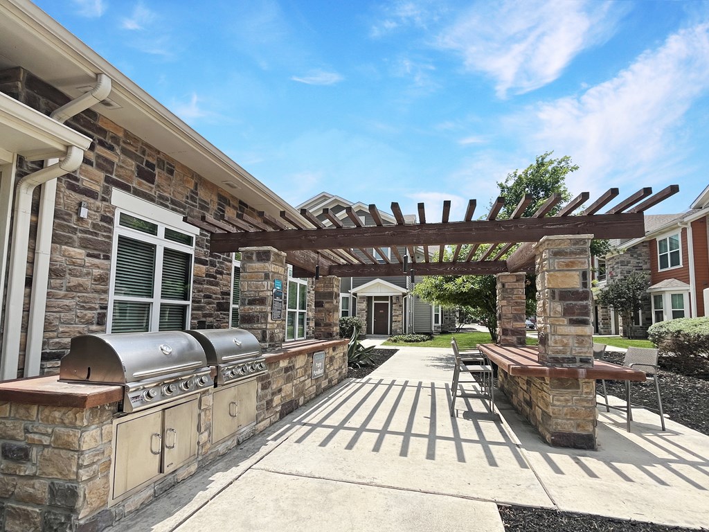 Outdoor BBQ pavilion adjacent from the pool