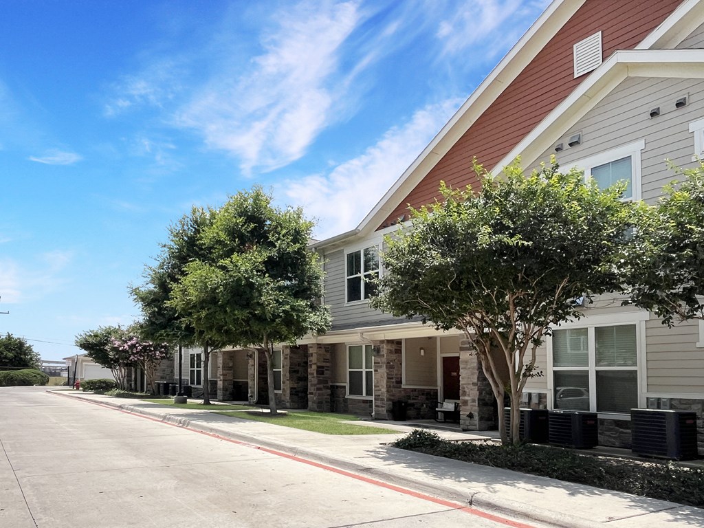 Exterior shot of the community including private porches and front doors