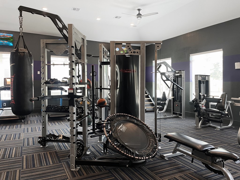 24-hour fitness center with cardio and hit equipment