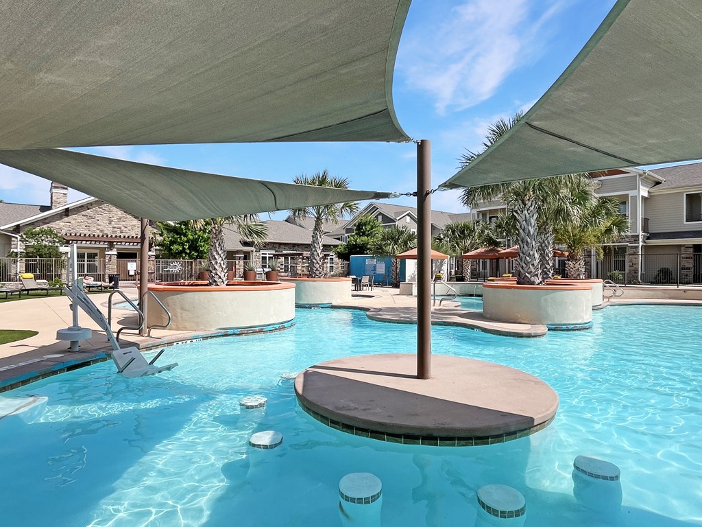 In pool seating with sunshades