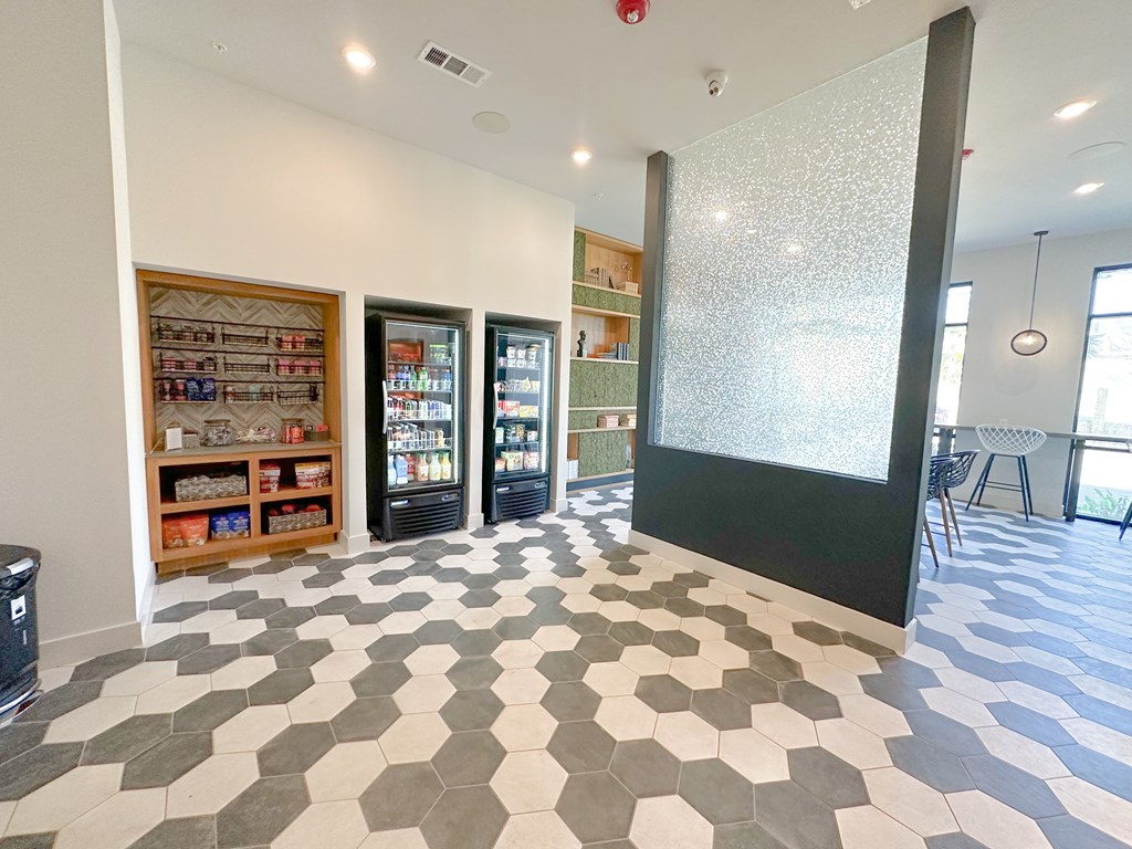 a view of the entrance to the library with a black and white checkered floor