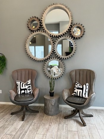 The Palms update clubhouse, two leather chairs, mirror art on the walls - Photo Gallery 5