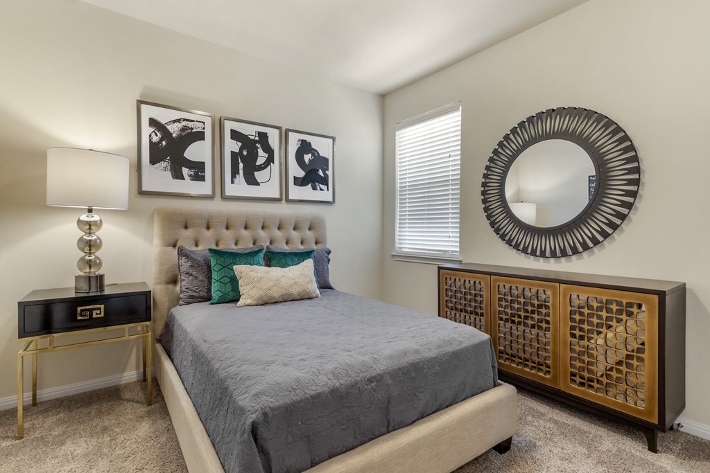 Secondary bedroom with carpet