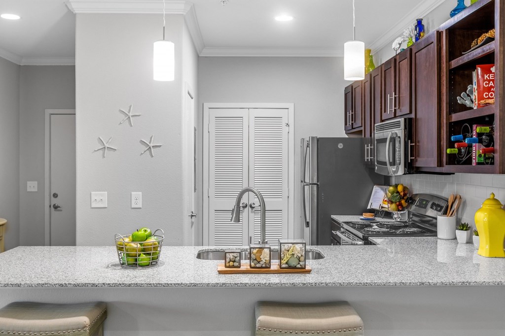 Traditional Kitchen with Cherry Wood Cabinetry and Island