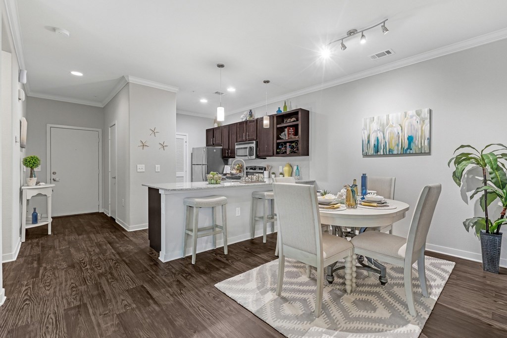 Dining area opening up to traditional kitchen