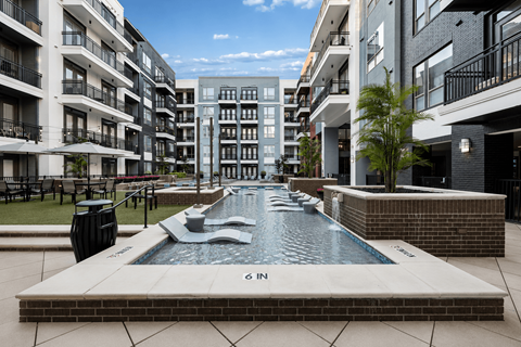Pool in the middle of a courtyard at L2 Uptown in Dallas Texas
