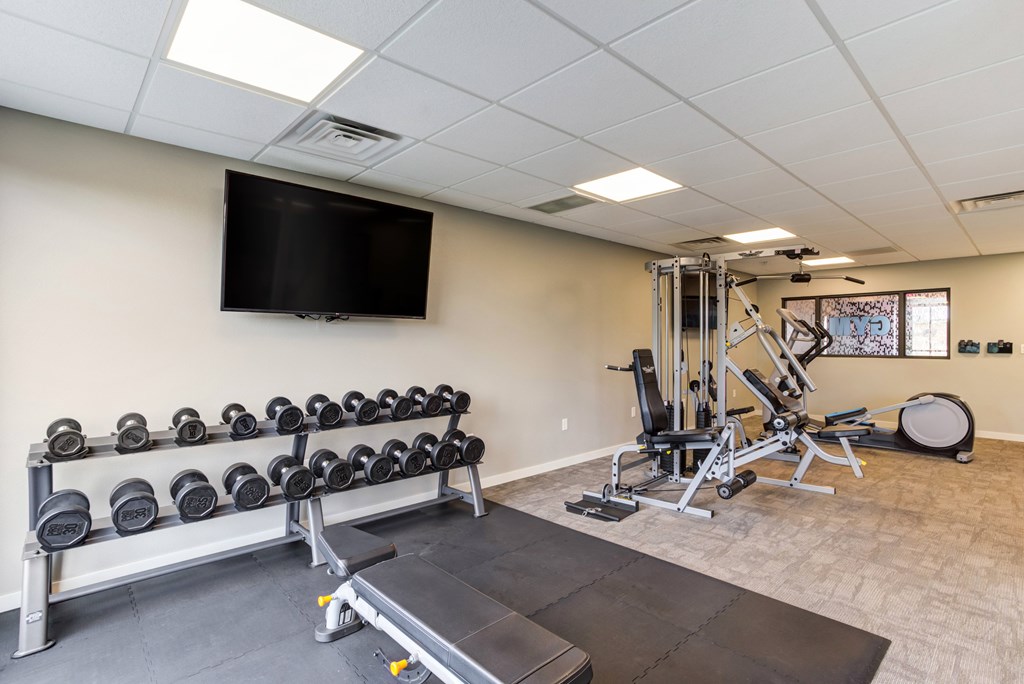 Fitness Center with free weights and cable machines