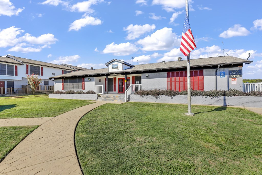 a building with an flag in front of it