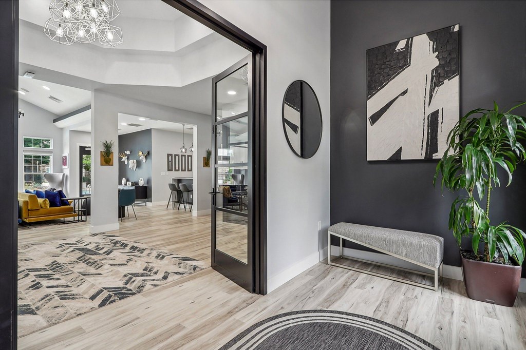 leasing office lobby area which leads to the clubhouse