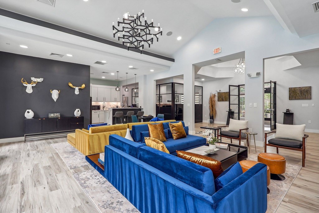 resident clubhouse with seating and kitchen