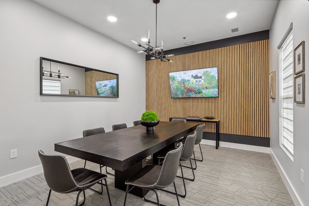 Conference room with seating and television