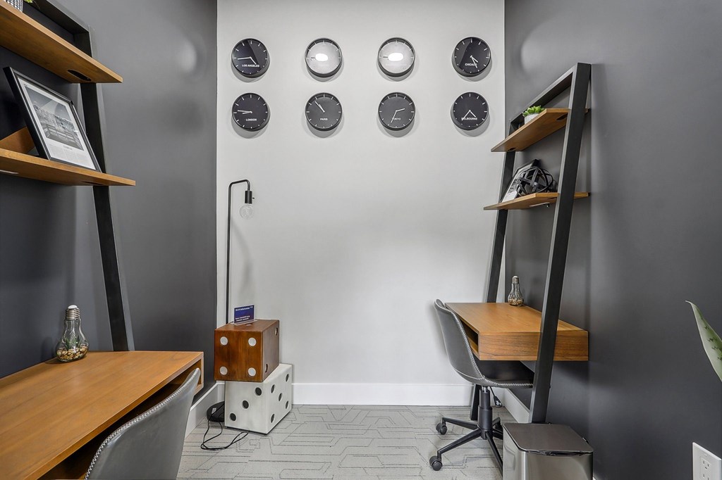 business center with two desks and chairs