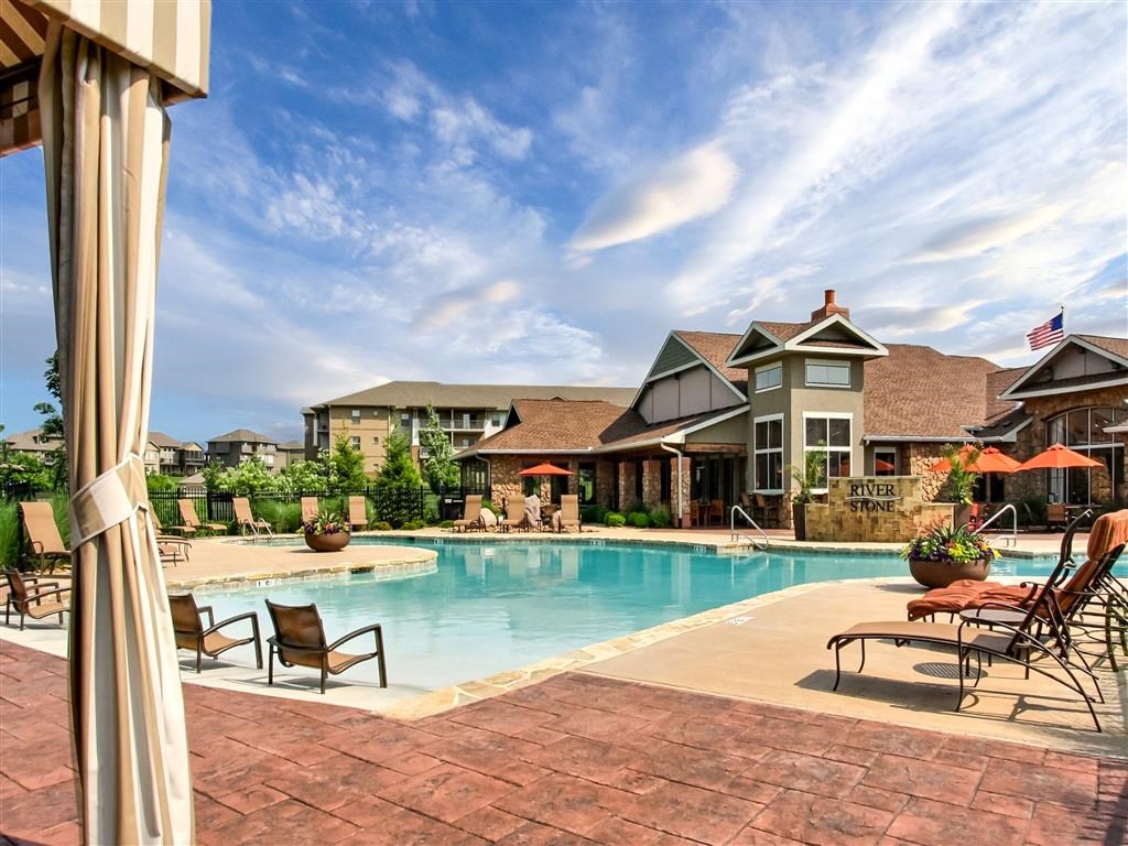 Pool with large sundeck and furniture
