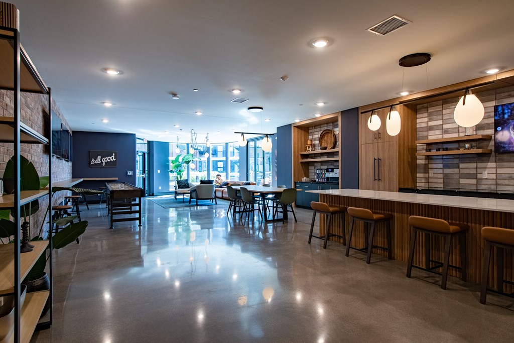 a restaurant with blue walls and a white counter top