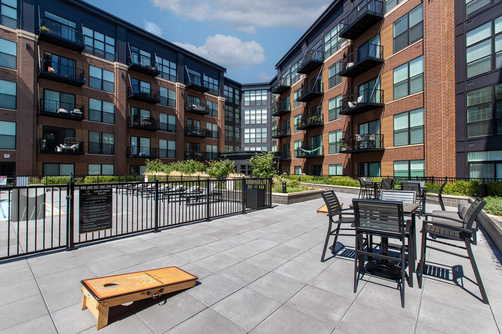 our apartments showcase a naturally well lit living area with a fireplace