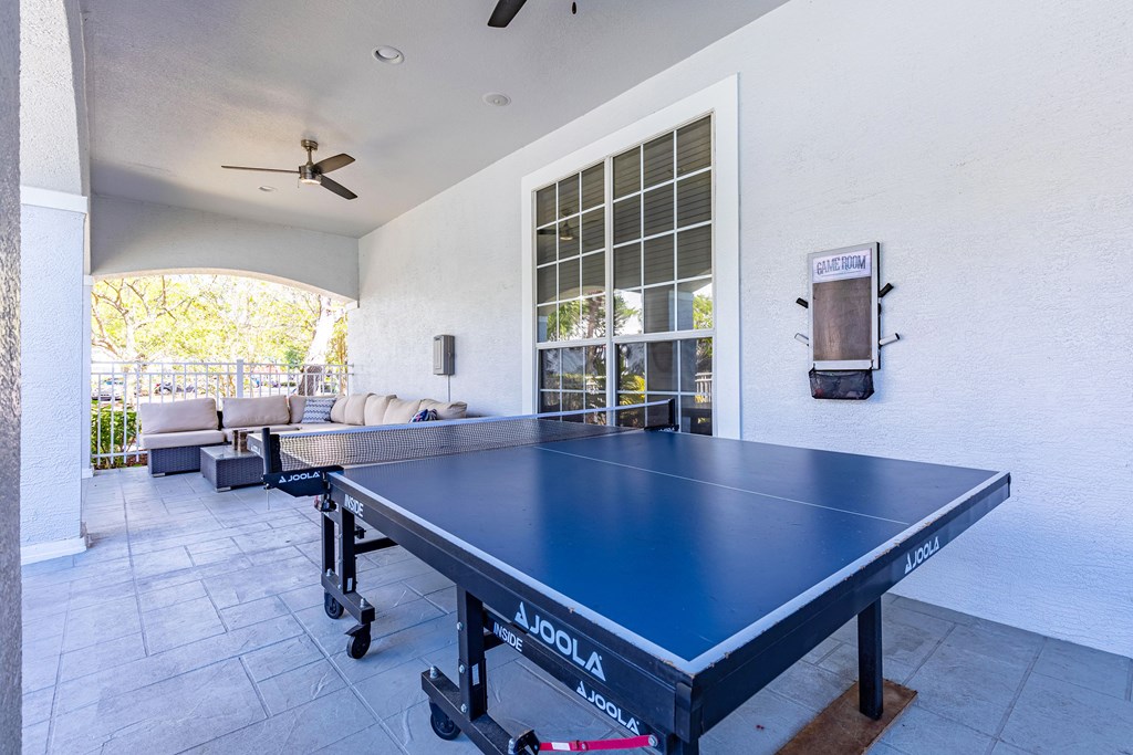 play a game of ping pong in the covered patio