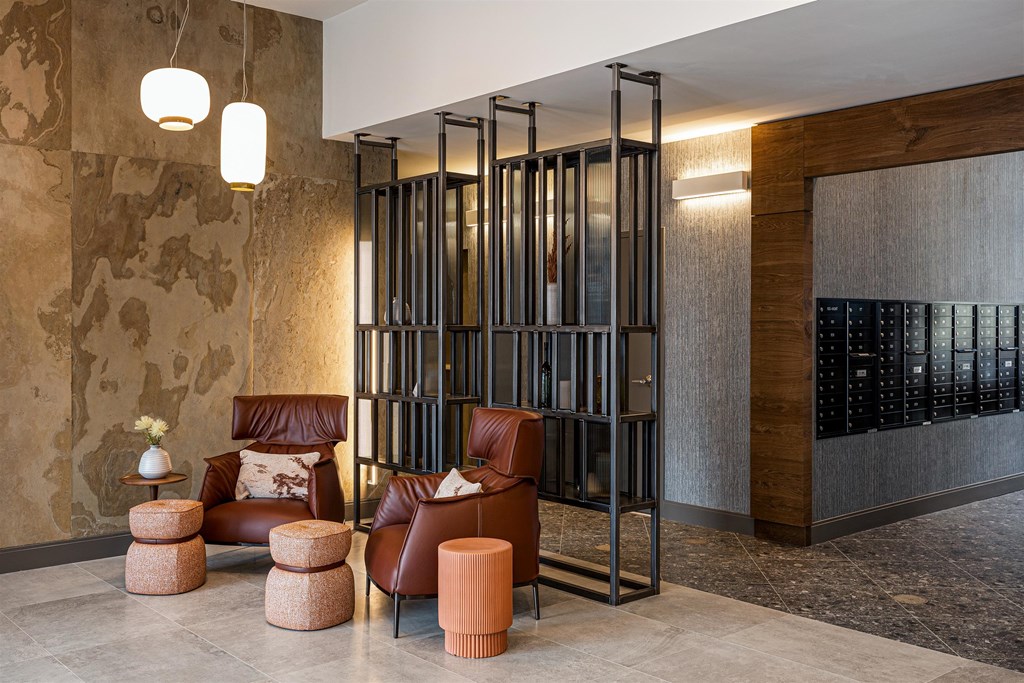 a lobby with chairs and a wine cellar