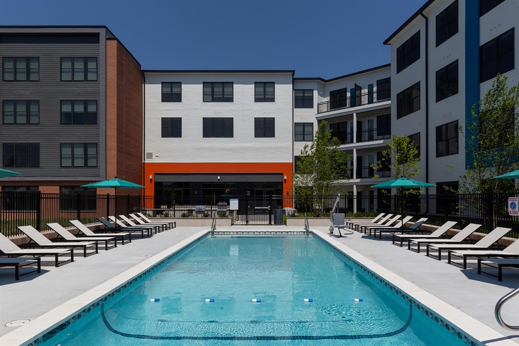 the swimming pool at the voltaire apartments