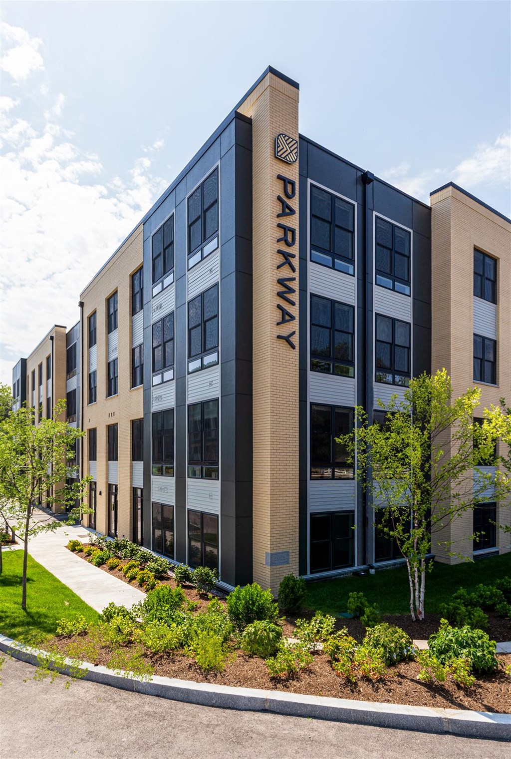 a building with the name of moxy on the side of it